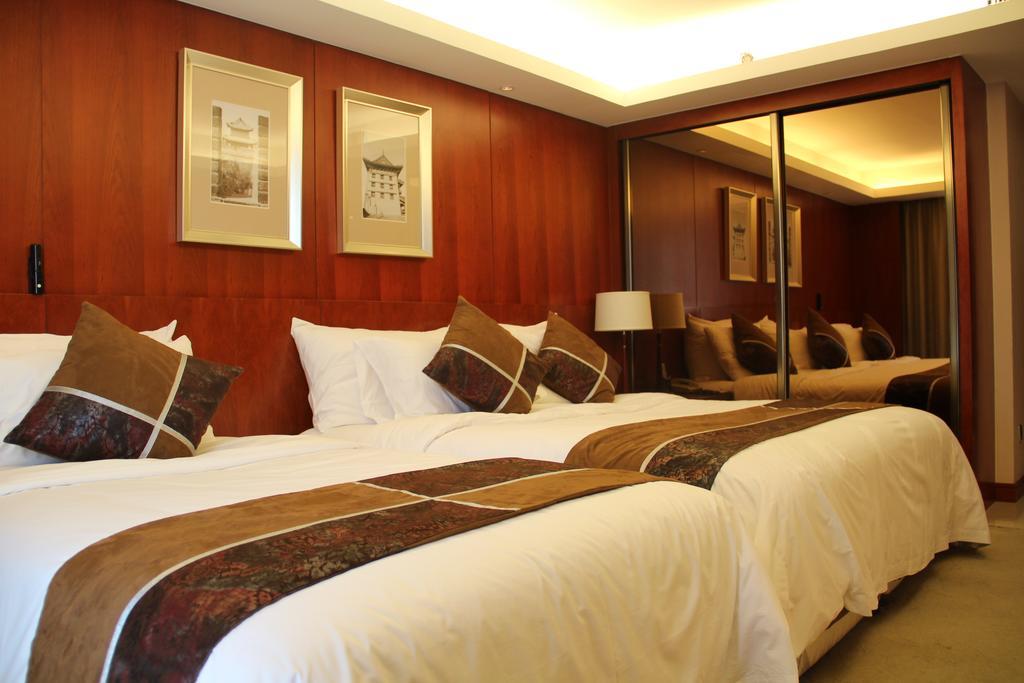 Xi'An Qu Jiang Yin Zuo Hotel Номер фото