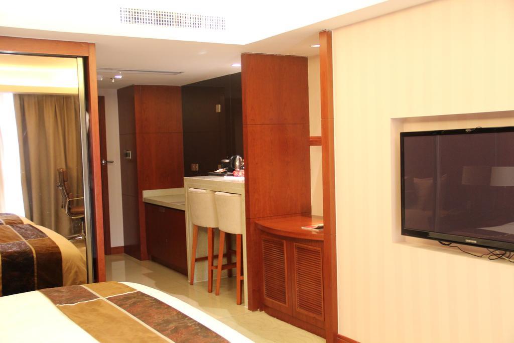 Xi'An Qu Jiang Yin Zuo Hotel Номер фото
