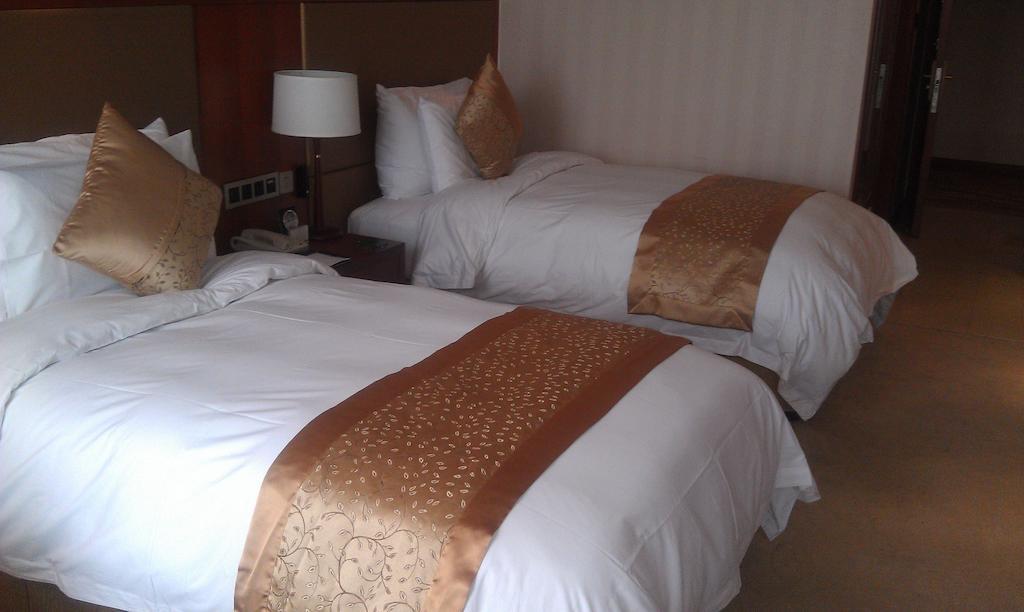 Xi'An Qu Jiang Yin Zuo Hotel Экстерьер фото